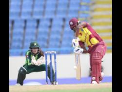 West Indies Women’s Hayley Matthews (right) in action against Pakistan Women in their first of three Twenty20 International matches in Antigua yesterday.