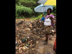 Kemeshia Page talks about the Duhaney River that flows near to her home.
