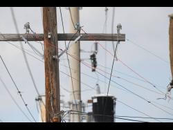 A number of illegal connections on JPS power lines.