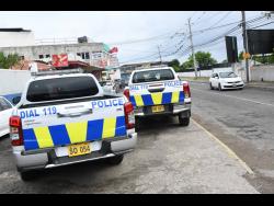 Park Lane, located off Red Hills Road in Kingston, was the scene of a major shooting incident on Saturday. Seven persons were shot, three of them fatally.