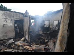 A Kingston family suffered a devastating blow after their house was razed in an early morning blaze yesterday.