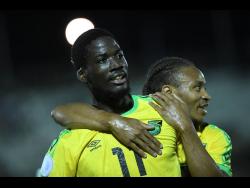 Shamar Nicholson (left) celebrates with Bobby Reid after scoring a goal in the Concacaf Nations League against Antigua and Barbuda on September 6, 2019. Nicholson will lead Jamaica’s lines in World Cup qualifying action against Mexico.