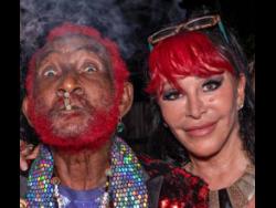 Lee ‘Scratch’ Perry (left) and his wife Mireille during his 85th birthday celebration earlier this year. 