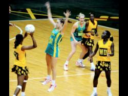 File photo shows Jamaica and Australia’s Under-21 netball teams in a  match at the National Arena on November 23, 2012. Former Sunshine Girls assistant coach, Winston Nevers, is proposing that the national Under-21 team should have been drafted as replacement for South Africa in the Tri-nation series that also involves Trinidad & Tobago.