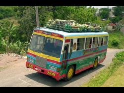 Remember riding buses like this in the country? Back in the days, these were the buses that were popular on routes in Jamaica. Inset: Oliver Samuels