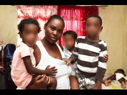 Kerry-Ann Anderson with three of her children.