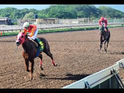 BILLY WHIZZ strides to victory in the Royal Dad Trophy at Caymanas Park on Saturday, October 9.