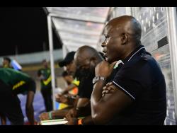 Jamaica head coach Paul Hall in the dugout during their FIFA World Cup qualifier against Mexico at the National Stadium in Kingston on Thursday.