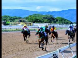 SILVERSTINE, ridden by Romario Spencer, wins the eight-race over 5 1/2 furlongs, a four-year-old and Upwards Maiden Condition Race at Caymanas Park on Saturday.