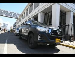 Police personnel maintain a heavy presence as the Clansman-One Don trial continues.