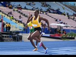 Alexis James of Petersfield High wins her Class One 100 metres heat in 11.72 seconds on yesterday’s opening day of the 2022 ISSA/GraceKennedy Boys and Girls’ Athletics Championships at the National Stadium.   