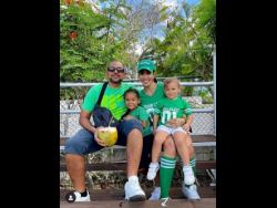 Dancehall icon and father of two Sean Paul sits with his son Levi Blaze, wife Jodi and daughter Remi Leigh Henriques. 