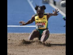 Serena Cole on her way to gold in the Girls U20 Long Jump event at the Carifta Games in Kingston yesterday.
