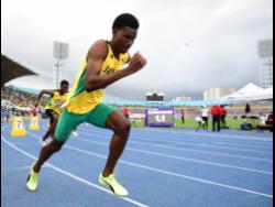 Jamaica’s J’Voughnn Blake on his way to gold in the boys U20 800m final at the Carifta Games in Kingston on Monday.