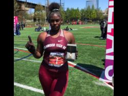 Holmwood Technical High School’s Cedricka Williams displays her Penn Relays commemorative watch after she won the Championship of America girls’ discus throw with a personal best 54.00m in Philadelphia, United States, on Thursday.