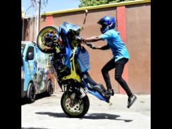Stunt rider Barrington ‘Daylight’ Heslop shows off his skills.