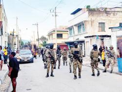 Members of the Jamaica Defence Force in Denham Town, west Kingston. 
