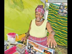 Reverend Dorothy Price-Maitland, secretary of the African Gardens Farmers Project, shows off products made by the group at last weekend’s Agrofest, held at the Hope Gardens in St Andrew.