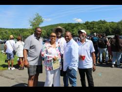 Richard Chambers (centre), one of the founders of the Trelawny annual picnic,  along with (from left) Baldwin Huie, Dahlia Gordon, Oliver Huie and Paul Earle at the annual Trelawny Day Picnic held on May 29. 