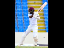 West Indies captain Kraigg Brathwaite hits four runs during the first day of the first Test against Bangladesh at the Vivian Richards Cricket Stadium in North Sound, Antigua and Barbuda on Thursday.