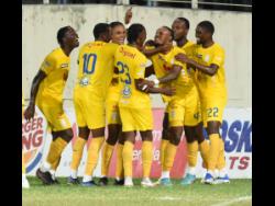 Harbour View FC’s Nicholas Hamilton (third right) celebrates with teammates after scoring against Arnett Gardens in the second leg of their Jamaica Premier League quarter-final match at Sabina Park in Kingston on Thursday, June 23.