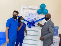 Mayor of St Ann’s Bay, Councillor Sydney Stewart (right), cuts the ribbon to officially open the Bravo Dental and Medical Centre in St Ann recently.  He is joined by Dr Alexandre Young (left) and his wife Dr Ruth-Ann Leveridge-Young, who both operate the facility.