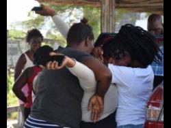 The discovery of four dismembered bodies in Tivoli Gardens, west Kingston, was too much for these women who have been searching for their loved ones since Saturday.