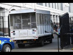 Alleged Clansman-One Don gang members arrive for trial.