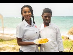 STAR foodie Shanel Lemmie (left) and Oshane ‘Chef Oshea’ Williams show off the finished product.STAR foodie Shanel Lemmie (left) and Oshane ‘Chef Oshea’ Williams show off the finished product.