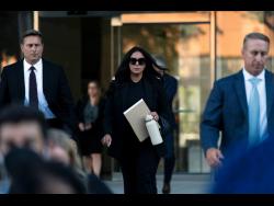 Vanessa Bryant (centre), the widow of Kobe Bryant, leaves a federal courthouse in Los Angeles on Wednesday. Kobe Bryant’s widow is taking her lawsuit against the Los Angeles County sheriff’s and fire departments to a federal jury, seeking compensation for photos deputies shared of the remains of the NBA star, his daughter and seven others killed in a helicopter crash in 2020.
