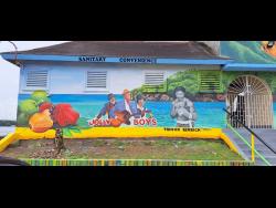 The public bathroom in Port Antonio, Portland on which murals of the Jolly Boys and former heavyweight champ Trevor Berbick was painted.