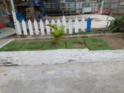 The word ‘peace’ has been carved into this lawn, a symbol of the residents’ wish for Jacques Road.