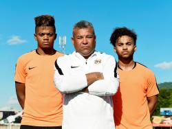 Phoenix Academy founder Craig Butler (centre) and sons Leon Bailey (left) and Kyle Butler. 