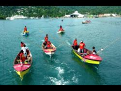 Fisherfolk prepare for the start of the Port Antonio Canoe Tournament in 2020, the last time the event was held, because of the COVID-19 pandemic.