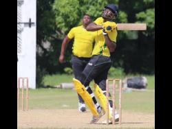Team B’s batsman Peat Salmon hooks off Team A’s pacer Oshane Thomas during his unbeaten half-century in the Jamaica Scorpions Super 50 practice match at Chedwin park yesterday. Team B won by 27 runs.
