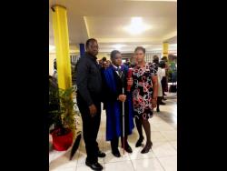 Kareem Vassell (centre) with his parents Neville and Vivenne.