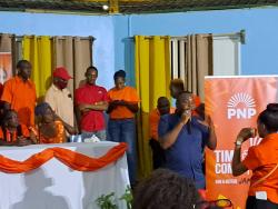 Matthew Rodney [second right] addresses the People’s National Party’s constituency conference for St James Central on Sunday. The meeting was held at Green Pond High School in the parish.