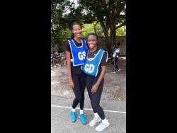 St Catherine’s goal shooter Kellian Hunter (left) and goal defence Ashrie Thomas.