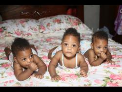 The Nicholson triplets (from left) Kahlia, Kamaya and Katalia.