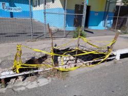 This hole in the sidewalk along Windward Road, Kingston, presents a major risk to pedestrians, including members of the disabled community. 