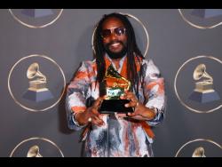 Kabaka Pyramid displays his Grammy Award after winning the Best Reggae Album category for his entry, ‘The Kalling’.