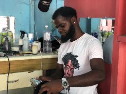 Despite not fulfilling his childhood dream of being a firefighter, Balbow Saunders has found his niche as a barber.