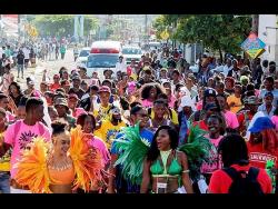 Ocho Rios Carnival masqueraders unite in the streets during the 2018 road march. 