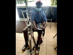 Cleveland Tulloch sits in his wheelchair while at THE STAR’s offices on Thursday.