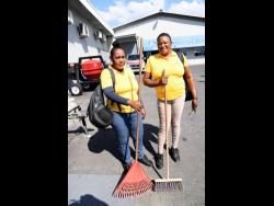 Street sweepers Sophia Davis (left) and Donna Hamilton.