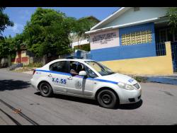 A police patrol vehicle in the community of Glendevon, St James.
