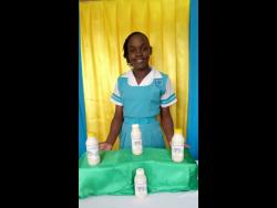 Jamaica 4-H National Girl of The Year, Natoya Williams, shows off her award-winning Cho-Cho Delight.