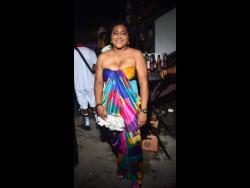 Claudine Fray dazzles in a colourful ensemble at Soul Food Tuesdays Anniversary party at Boomas Headquarters, 13 Mall Road, St Andrew recently.