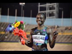 Nigerian Tobi Amusan celebrates winning the women’s 100 metres hurdles in a season’s best of 12.57 seconds at Racers’ Grand Prix at the National Stadium on Saturday.