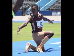 Our Lady of the Angel’s Jourdaine Burke celebrates winning the Class Two boys’ high jump at the JISA/Little Caesars Pizza National Prep Schools Track and; Field Championships at the National Stadium on Thursday.
